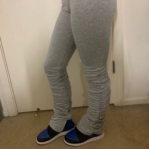 Stacked grey leggings